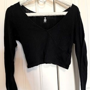 Black cropped long sleeve top